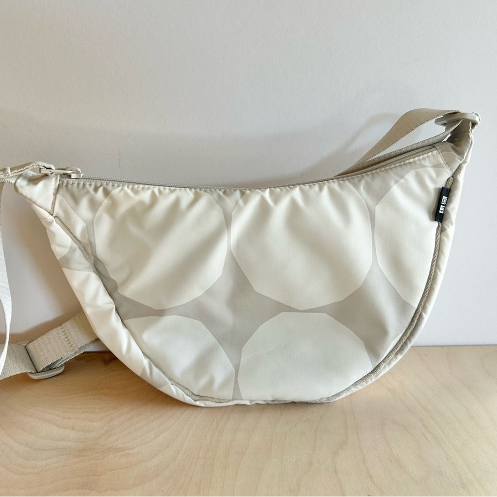 Uniqlo x Marimekko Round Mini Shoulder Bag in a cream and white